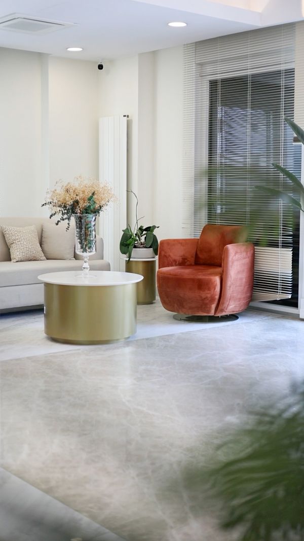 Lounge Area with colorful armchair and coffee table in Istanbul dental clinic