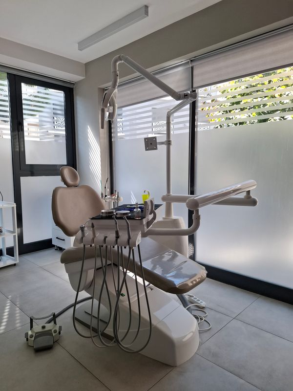Dental Patient Chair in a bright airy modern clinic with large windows